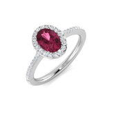 An oval pink tourmaline and diamond halo engagement ring, crafted in 9ct white gold, on a white background.